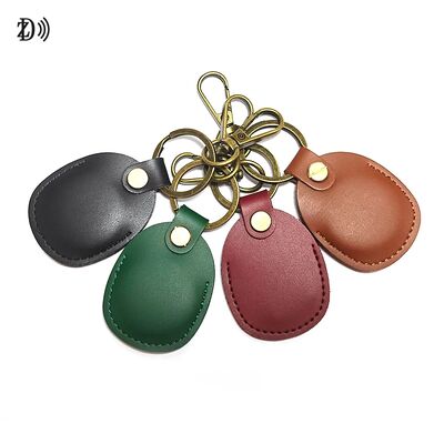 Chave de chave em relevo personalizada resistente à água 13,56MHz NFC Key Tag Leather Keyfob Wearable NFC RFID Keyfob